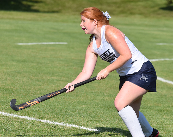 Le hockey sur gazon féminin en action